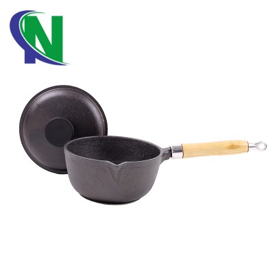 iron cast pots with wooden handles